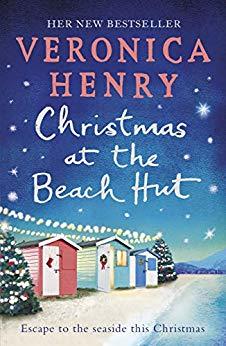 Christmas books set in England: Christmas at the Beach Hut by Veronica Henry. English Christmas books. Christmas novels set in England. Christmas books set by the sea. Christmas books set on the English coast. atmospheric Christmas books. English Christmas stories